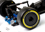 Exotek Racing F1 1/10 front rubber tires V2 40X in yellow, firm compound, designed for RC car racing, shown in the image.