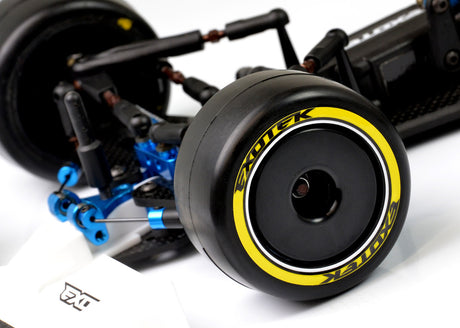 Exotek Racing F1 1/10 front rubber tires V2 40X in yellow, firm compound, designed for RC car racing, shown in the image.