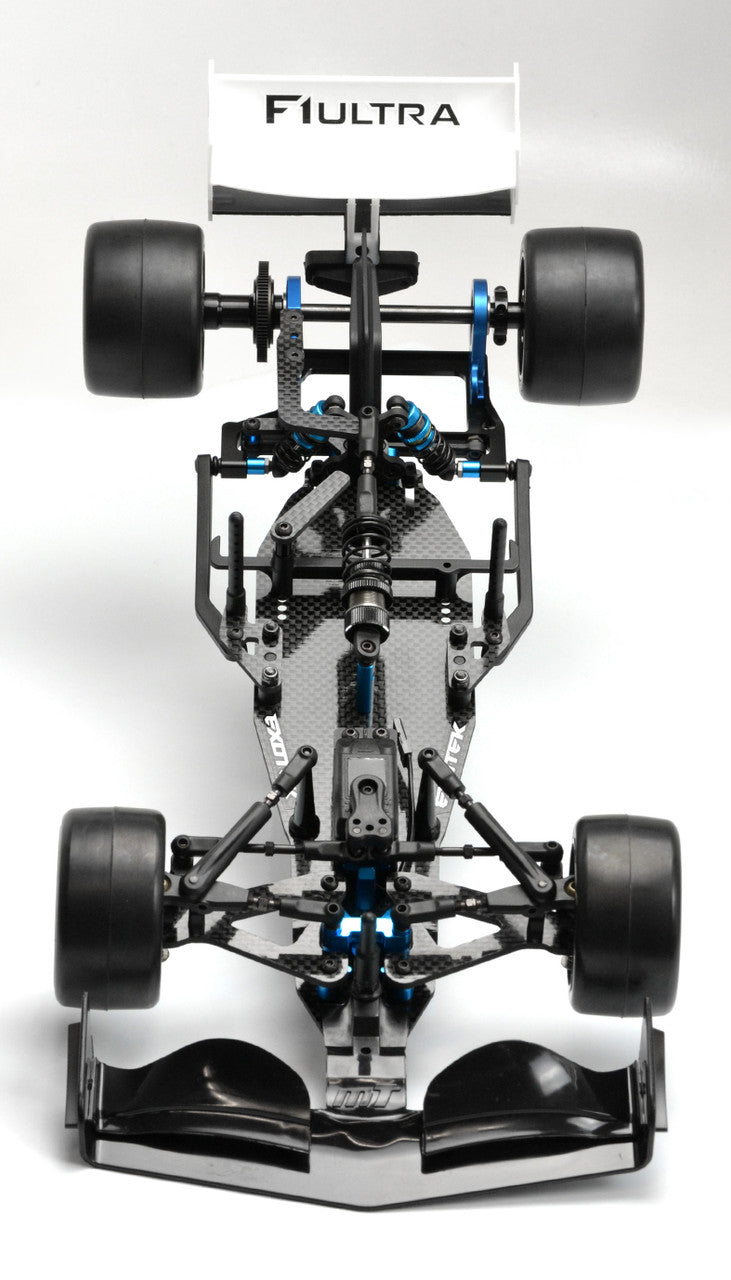 Close-up of Exotek Racing F1 Ultra R5 1/10 Formula 1 kit with detailed chassis and components visible.