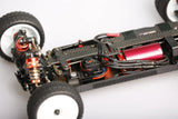 LC Racing LC12B1-HK 1/12 4WD competition buggy kit with motor and ESC, showing the assembled radio-controlled RC car on a track.