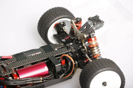 LC Racing LC12B1-HK 1/12 4WD Competition Buggy Kit with motor and ESC, showing detailed chassis and racing components.