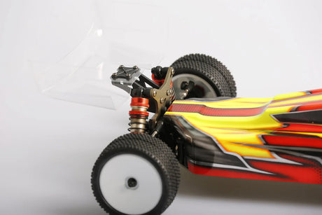 LC Racing LC12B1-HK 1/12 scale 4WD competition buggy kit with motor and ESC, showing the assembled RC racing buggy on a track.
