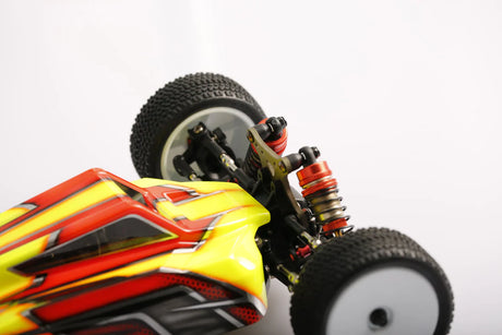 LC Racing LC12B1-HK 1/12 4WD competition buggy kit with motor and ESC, showing the assembled radio-controlled racing car.