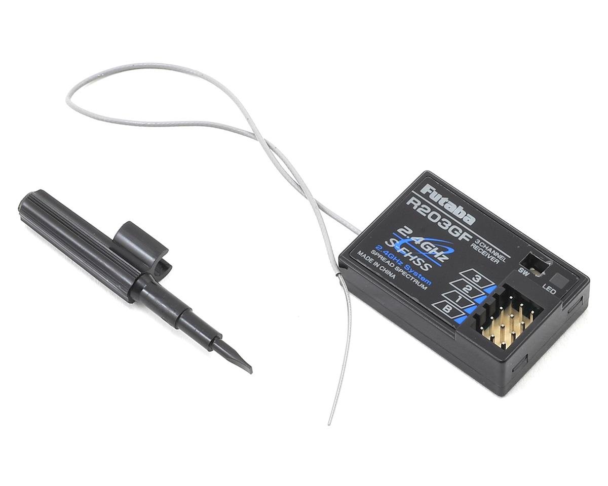 Futaba 3PV 3-channel 2.4GHz S-FHSS radio system with R203GF receiver, featuring control sticks and display screen.