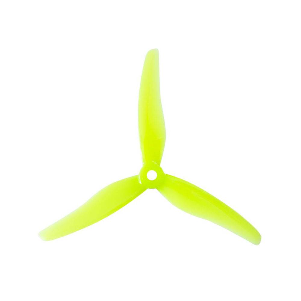 Two pairs of yellow Gemfan Hurricane 51433 3-blade drone propellers for quadcopters, showcasing their lightweight design and aerodynamic shape.