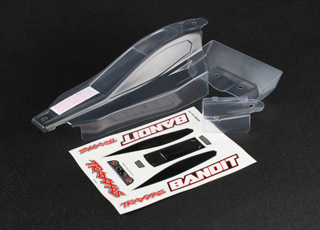 Traxxas Bandit clear RC car body with wing, lightweight plastic shell for remote control racing vehicles.
