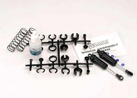 Pair of Traxxas long black front ultra shocks with springs for RC trucks, featuring durable construction and precise fit.