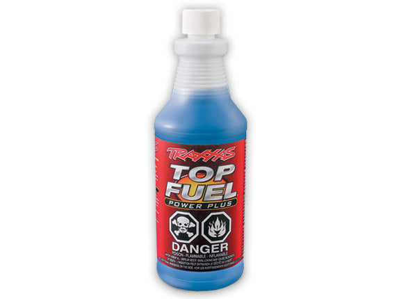 Traxxas 33% Nitro Top Fuel container, 1-quart size, with label showing fuel specifications and branding.