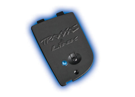 Traxxas Link Wireless Bluetooth module for remote control cars, compact device with blue and black design.