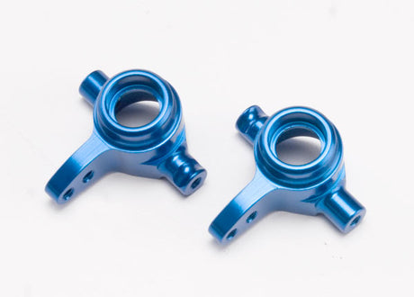 Traxxas blue aluminum left and right steering blocks for RC car, durable and precision-machined.