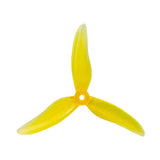 Yellow Gemfan Hurricane 51499 3-blade drone propellers mounted on a drone for stable flight and efficient performance.