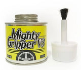 Close-up of the Hobby Addicts Mighty Gripper v3 hand grip strengthener showing textured handles and adjustable tension dial.