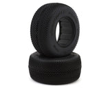 Pair of green JConcepts Relapse Short Course Tires for RC cars, showing tread pattern and sidewall details.
