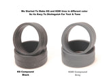 Pair of PN Racing KS Compound Low Profile Slick 11mm Tires for RC cars, shown in black with detailed tread pattern.