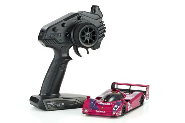 Kyosho Mini-Z RWD MR04 Jaguar XJR-14 remote control car on display, detailed scale model with sleek silver finish.