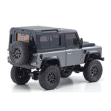Kyosho Mini-Z MX-01 4x4 Land Rover Defender 90 RC car in gray and black with detailed exterior and off-road tires.