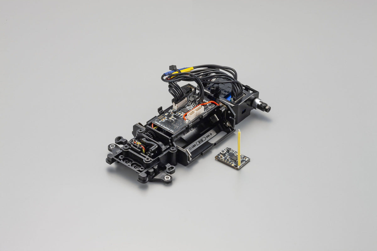 Kyosho MINI-Z Racer MR-04 EVO2 RC car chassis with W-MM/5600KV motor, detailed view of the lightweight racing chassis.