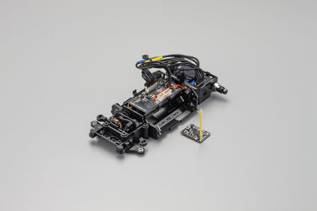 Kyosho MINI-Z Racer MR-04 EVO2 RC car chassis with W-MM/5600KV motor, detailed view of the lightweight racing chassis.