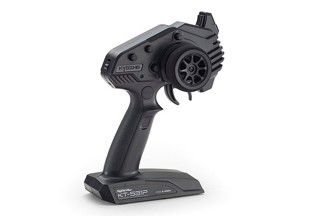Kyosho KT-531P remote transmitter with digital display and control sticks for RC vehicle operation.