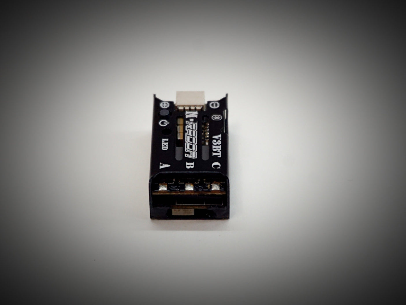 Team Powers M-Radon V3BT 30A Bluetooth ESC for RC cars, shown with wiring and connection ports.