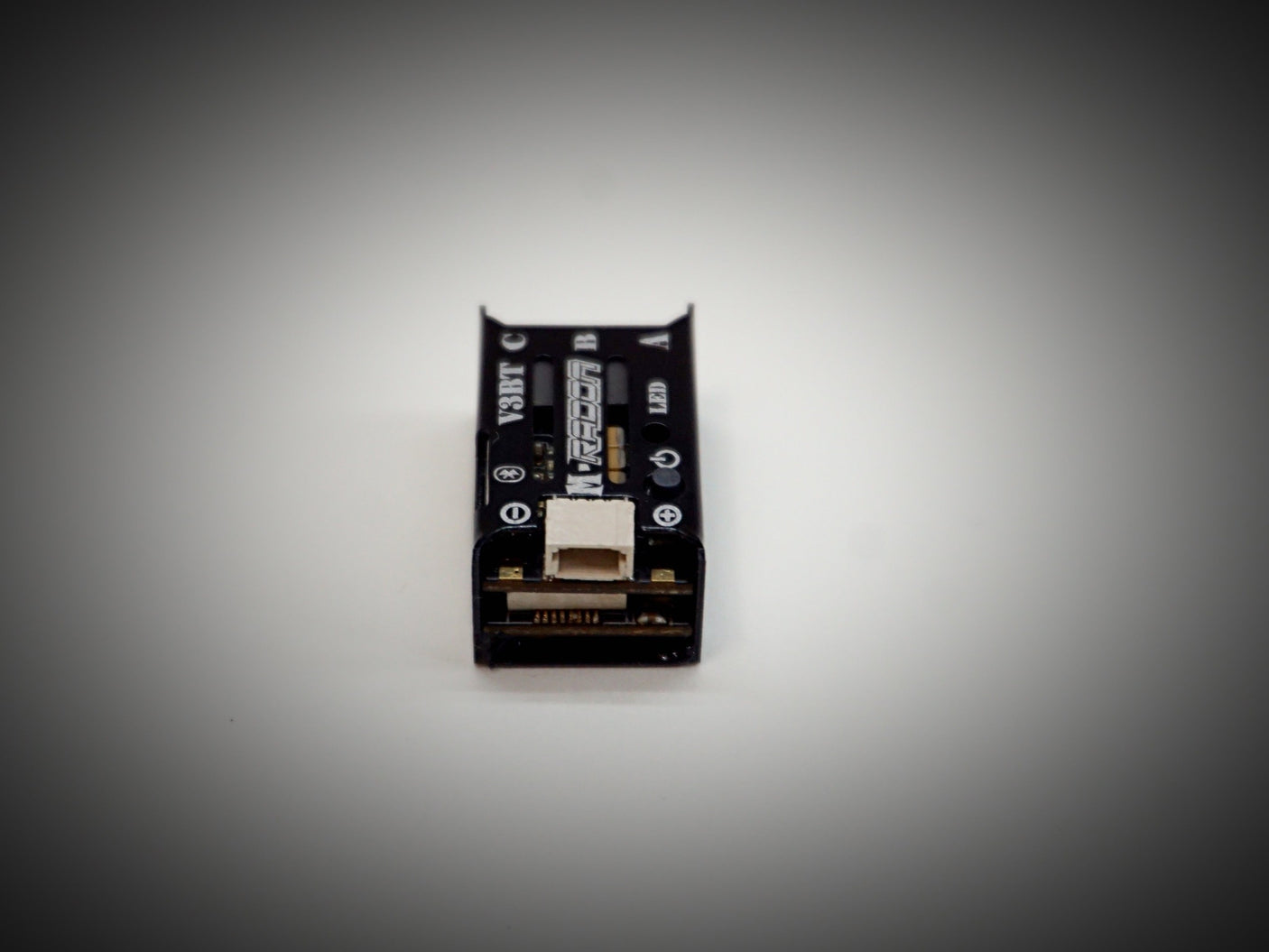 Team Powers M-Radon V3BT 30A Bluetooth ESC for RC cars, showing the compact electronic speed controller with Bluetooth connectivity.