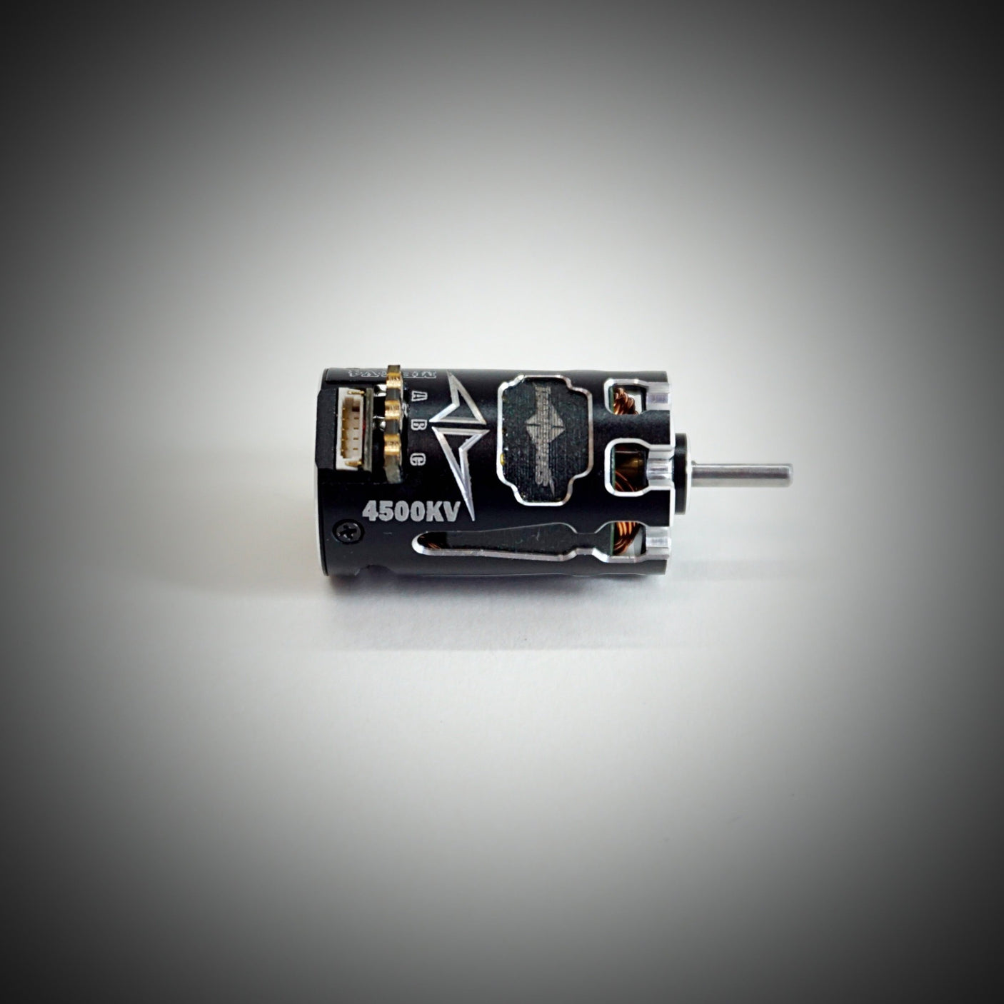 Team Powers MBX V4 Mini-Z RC car with sensored brushless motor, detailed close-up showing the motor and vehicle components