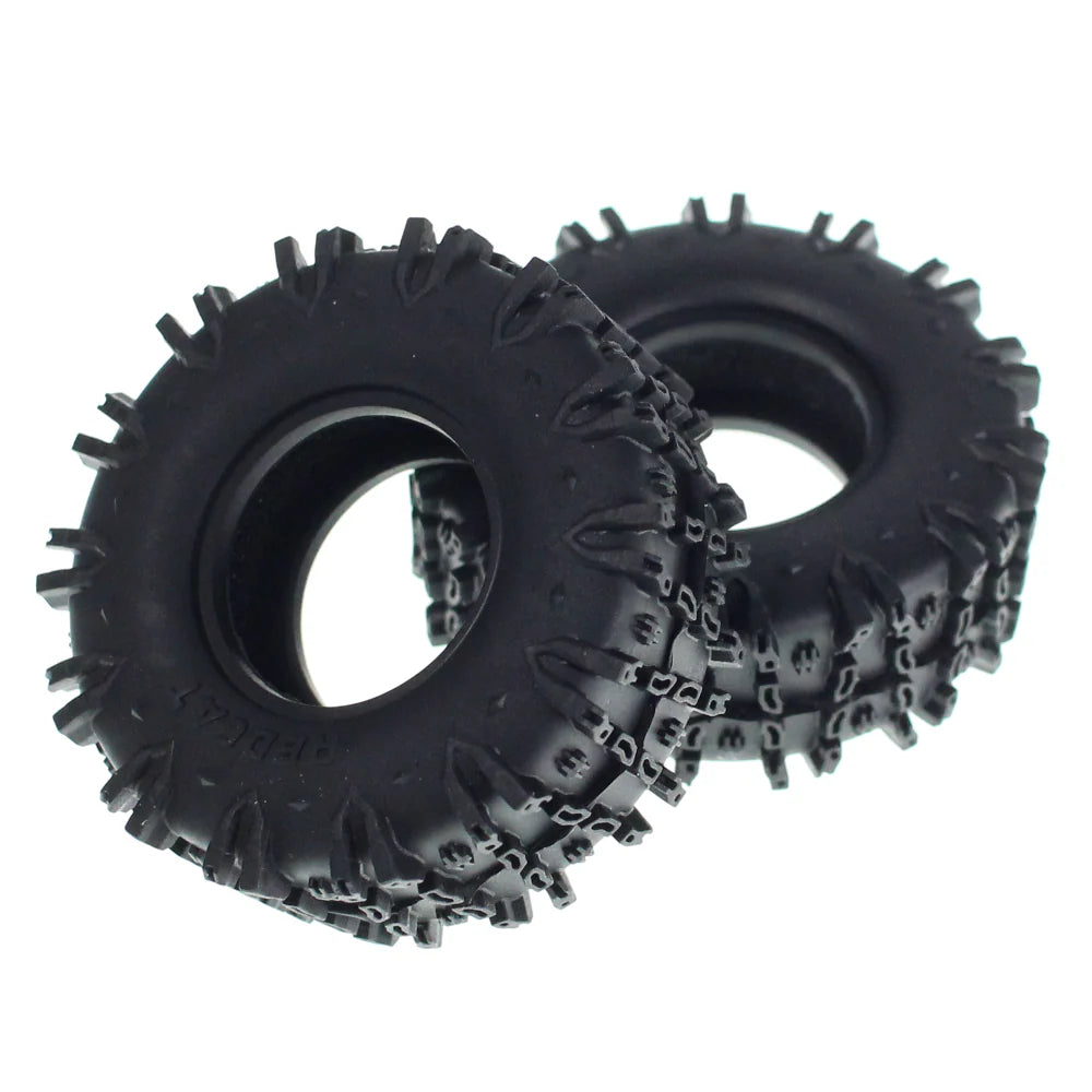 Pair of Redcat 1.3-inch Soft Apex Tires for RC cars, featuring red rubber treads and durable sidewalls for off-road use.