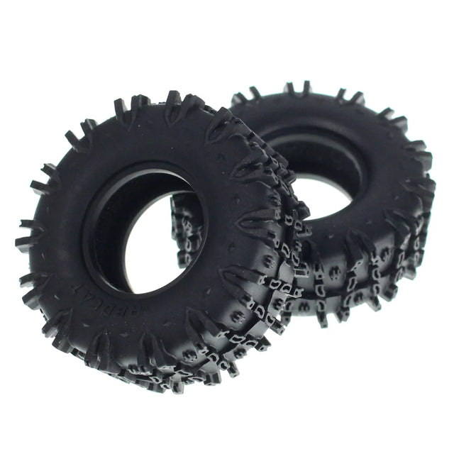 Pair of Redcat 1.3-inch Soft Apex Tires for RC cars, featuring red rubber treads and durable sidewalls for off-road use.