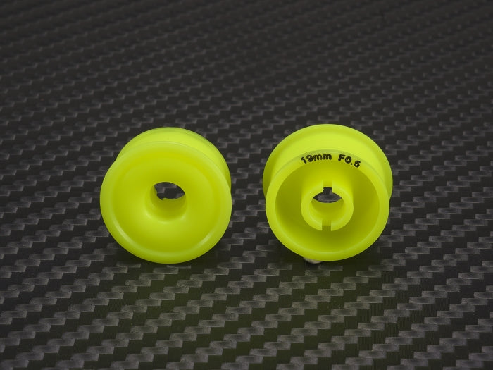 PN Racing Delrin flanged wheel, 8.5x19mm size, yellow color, designed for RC cars with precise machining and durable material.