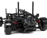 Red MST RMX 2.5 1/10 2WD brushless RTR drift car with detailed body and wheels, ready for high-performance drifting.