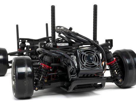 Red MST RMX 2.5 1/10 2WD brushless RTR drift car with detailed body and wheels, ready for high-performance drifting.