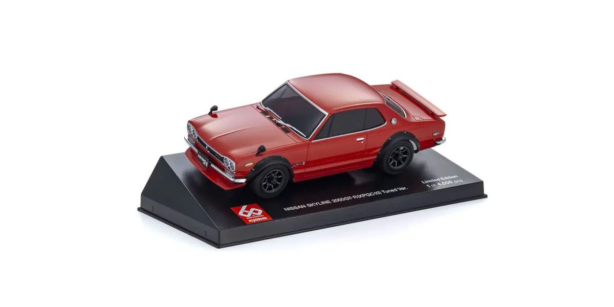 Kyosho Mini-Z ASC Nissan Skyline 2000GT-R 60th Anniversary RC car part, close-up of component with branding details.