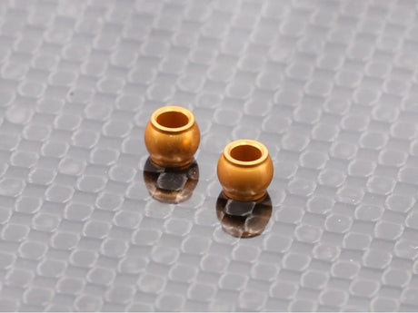 Radtec RC Mini-Z MR04 aluminum lower pivot ball for RC car suspension, shown in close-up with metallic finish and precision craftsmanship.