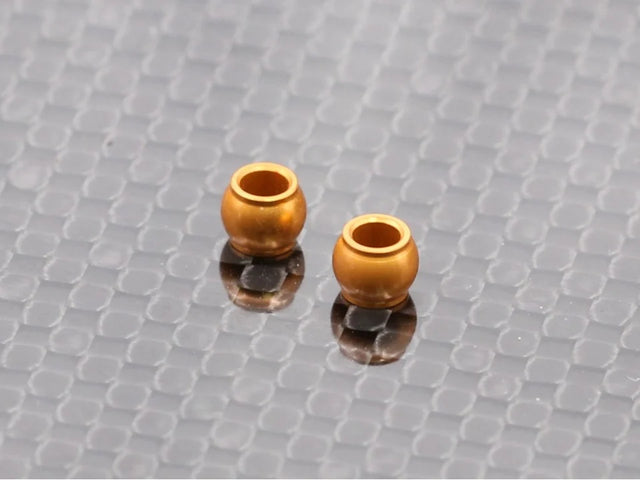 Radtec RC Mini-Z MR04 aluminum lower pivot ball for RC car suspension, shown in close-up with metallic finish and precision craftsmanship.