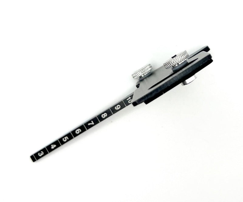 Racers Edge aluminum RC car ride height and camber gauge, silver tool for adjusting suspension and alignment.
