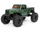 Redcat Ascent-18 1/18 scale 4WD RTR brushless rock crawler with rugged tires and detailed chassis for off-road adventures.