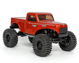 Redcat Ascent-18 1/18 scale 4WD brushless rock crawler with red chassis and large tires for off-road adventures.