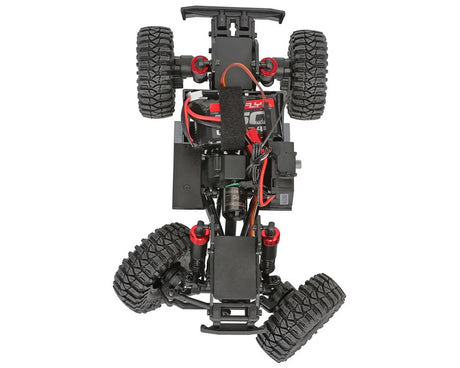 Redcat Ascent-18 1/18 scale 4WD brushless rock crawler with red body and rugged tires, ready for off-road adventures.