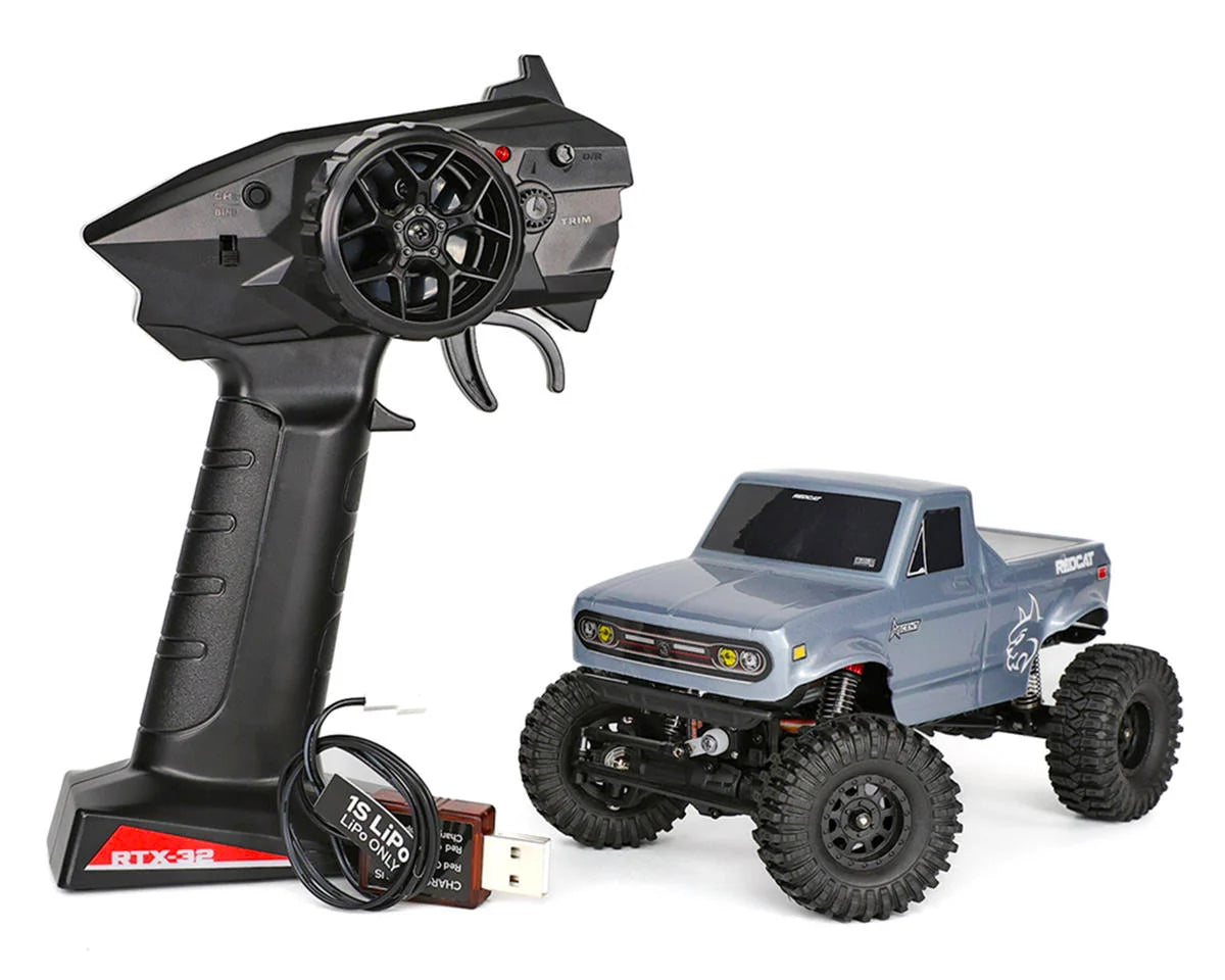 Redcat Ascent-32 1/32 scale 4WD RTR rock crawler with red chassis and rugged tires, ready for off-road adventures.