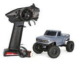 Redcat Ascent-32 1/32 scale 4WD RTR rock crawler with red chassis and rugged tires, ready for off-road adventures.