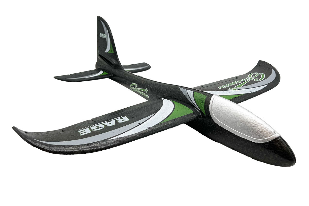 Rage RC Streamer Hand Launch Glider flying outdoors against a clear sky, showcasing its lightweight foam construction and aerodynamic design.