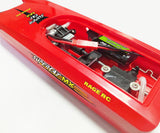 Rage RC SuperCat MX electric micro RTR boat speeding through water, featuring sleek hull design and vibrant color scheme.