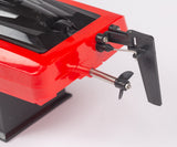 Rage RC SuperCat MX electric micro RTR boat racing on water, featuring sleek design and vibrant colors.