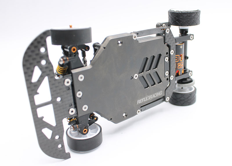 Reflex Racing RX28SE Worlds Edition 2WD RC car kit with detailed chassis and vibrant red and black body design.