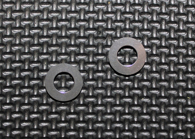 Reflex Racing RX403 lightweight diff rings shown in a close-up image, highlighting their durable metal construction and precise fit.