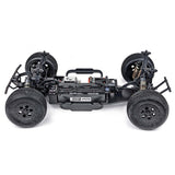 Tekno SCT410SL 1/10th scale 4x4 lightweight short course RC truck, driver side view with elevated angle