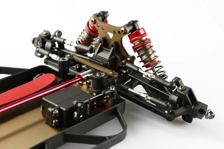 LC Racing EMB-1 1/14 4WD Buggy Kit with digital mini servo and adjustable saver, featuring detailed components and compact design.