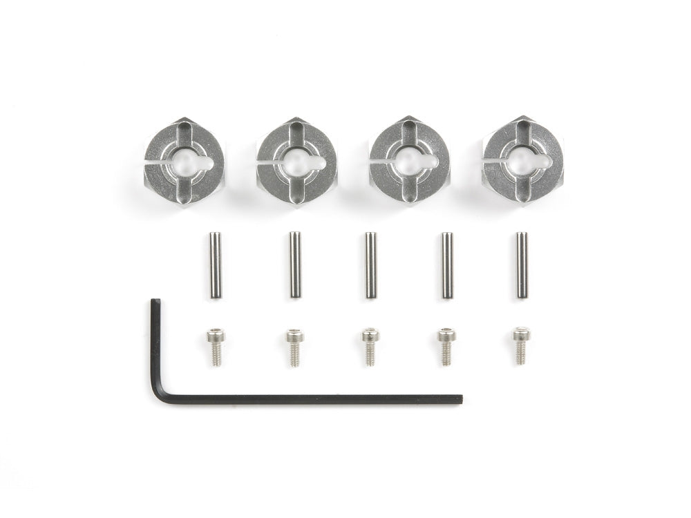 Set of four Tamiya 6mm aluminum wheel hubs for RC cars, durable lightweight metal with precise fit and finish.