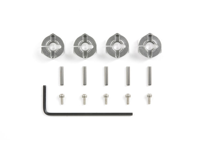 Set of four Tamiya 6mm aluminum wheel hubs for RC cars, durable lightweight metal with precise fit and finish.