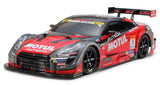Tamiya TT-02 Motul Autech GT-R RC car kit with detailed body and chassis components for hobby racing enthusiasts